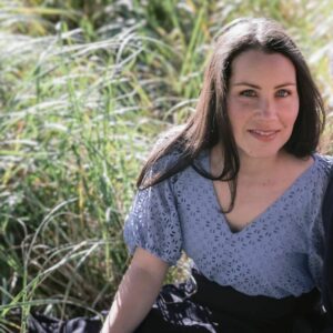 Tiffany Hill from Spectral Design conducting EMF testing and EMF measurement in a Sydney home using professional meters.