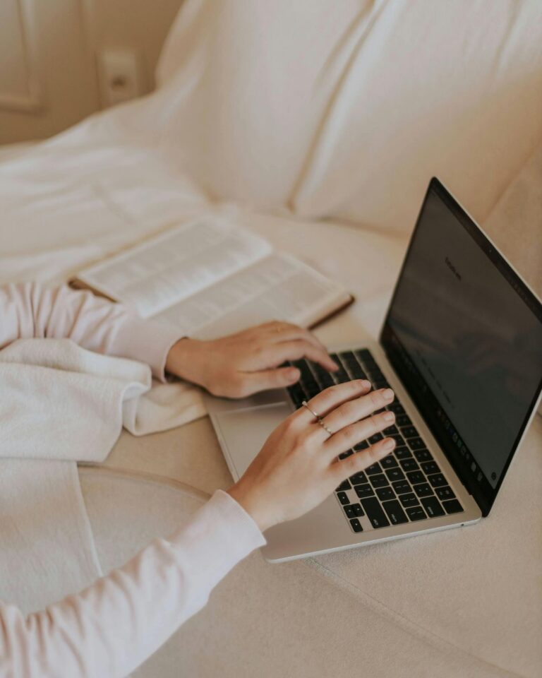 EMF testing woman on a laptop